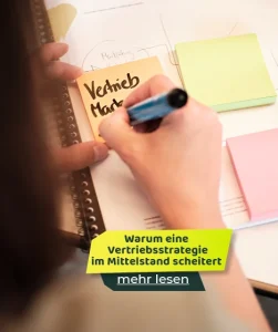 Notizbuch mit handschriftlicher Notiz zu Vertrieb und Marke